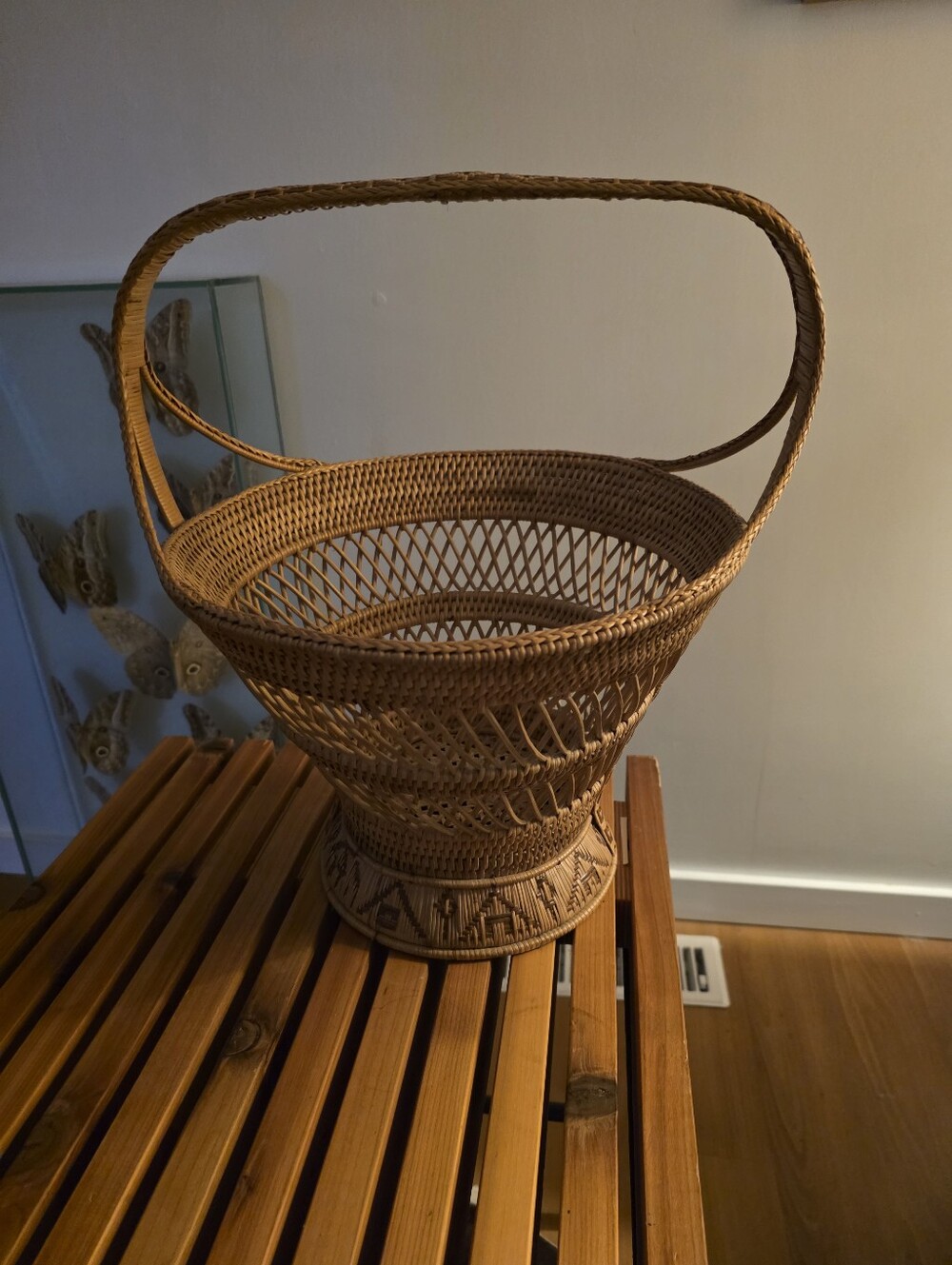 vintage woven wicker and bamboo pedestal basket with an arched handle